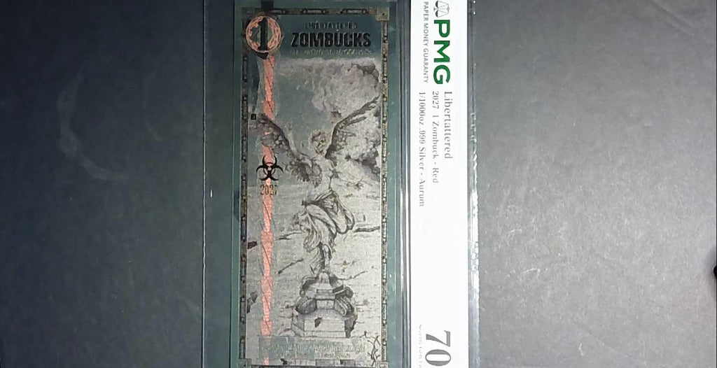 2027 Libertattered 1 Zombuck Red Aurum PMG 70★ – 1/1000 oz .999 Silver