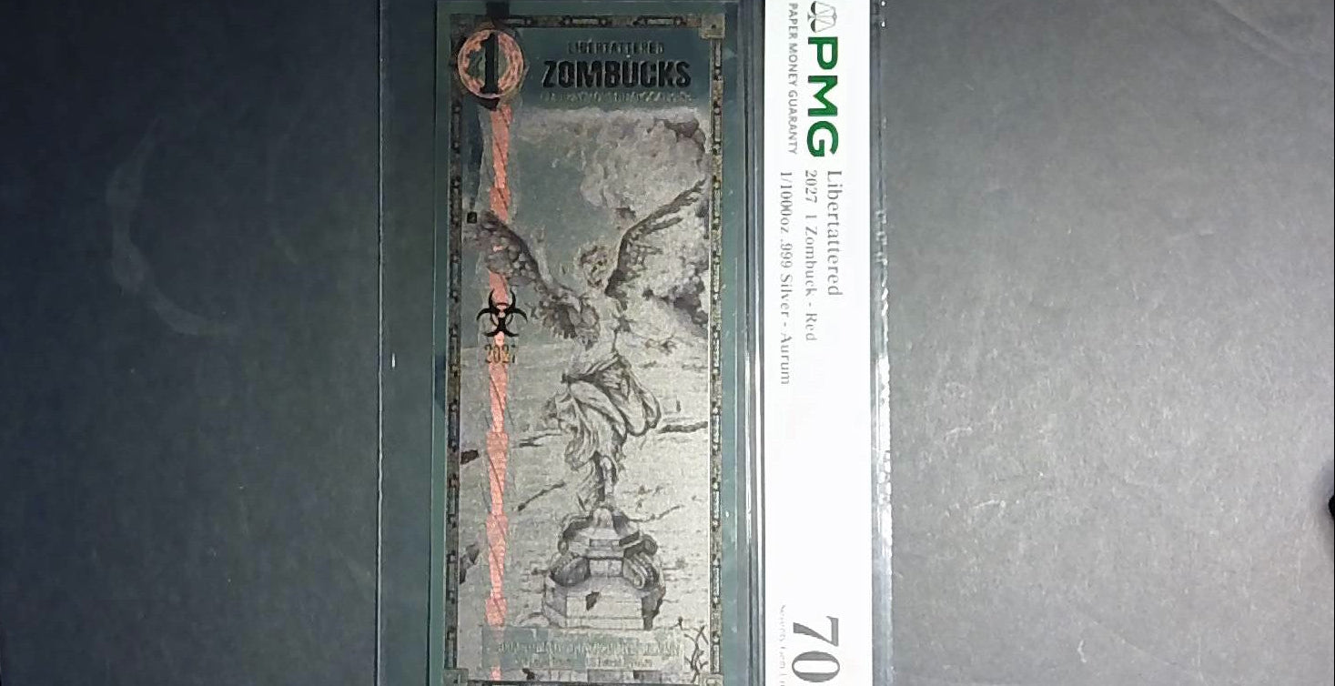 2027 Libertattered 1 Zombuck Red Aurum PMG 70★ – 1/1000 oz .999 Silver