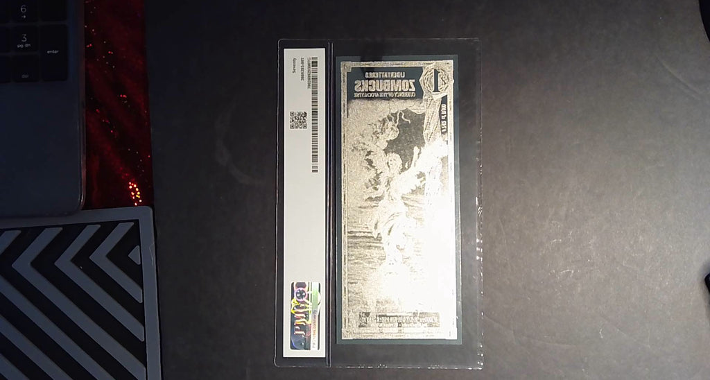 2027 Libertattered 1 Zombuck Red Aurum PMG 70★ – 1/1000 oz .999 Silver